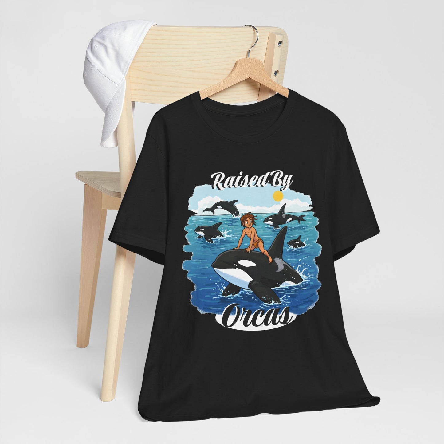 Funny 'Raised by Orca's' Tee - Perfect for Ocean Lovers, Beach Days, Summer Vacations, Gift for Marine Life Enthusiasts, Cute Animal Shirt
