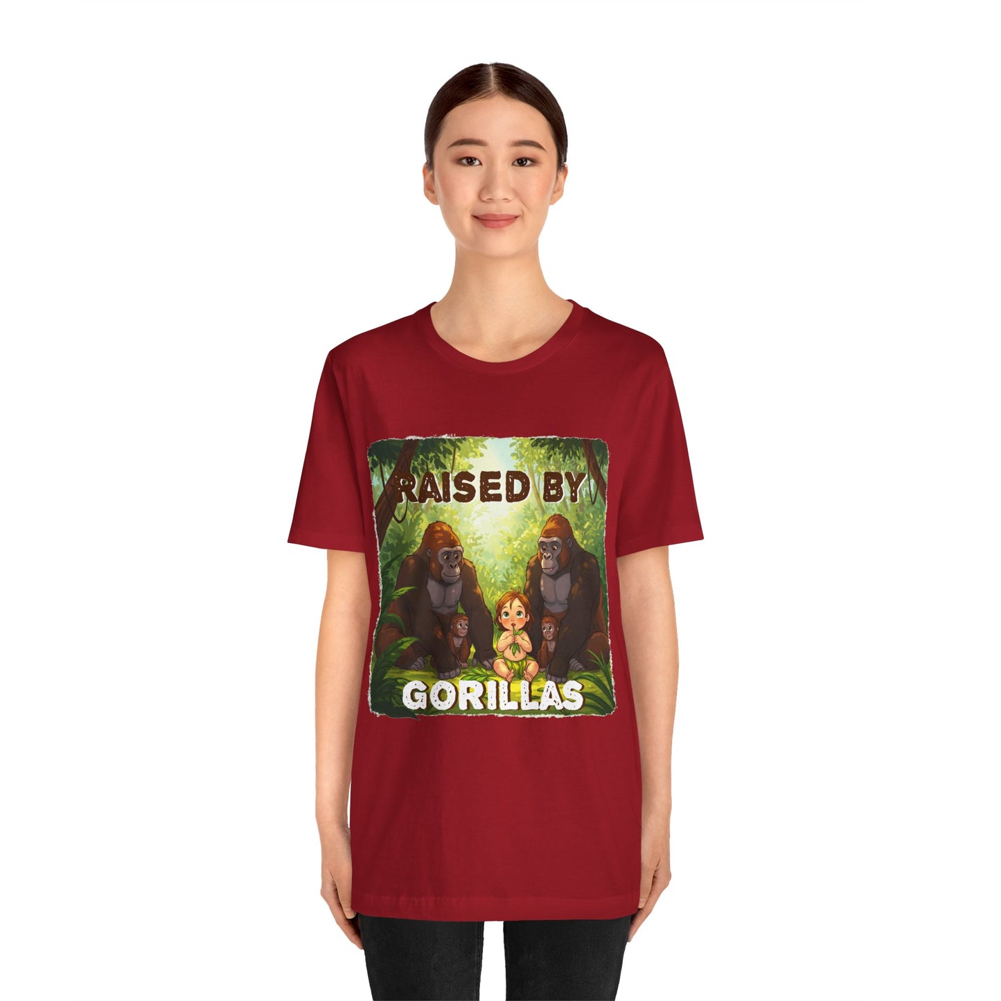 Funny Gorilla Graphic Tee - 'Raised by Gorillas' Unisex Jersey Shirt (Female character version) - Schmartypants