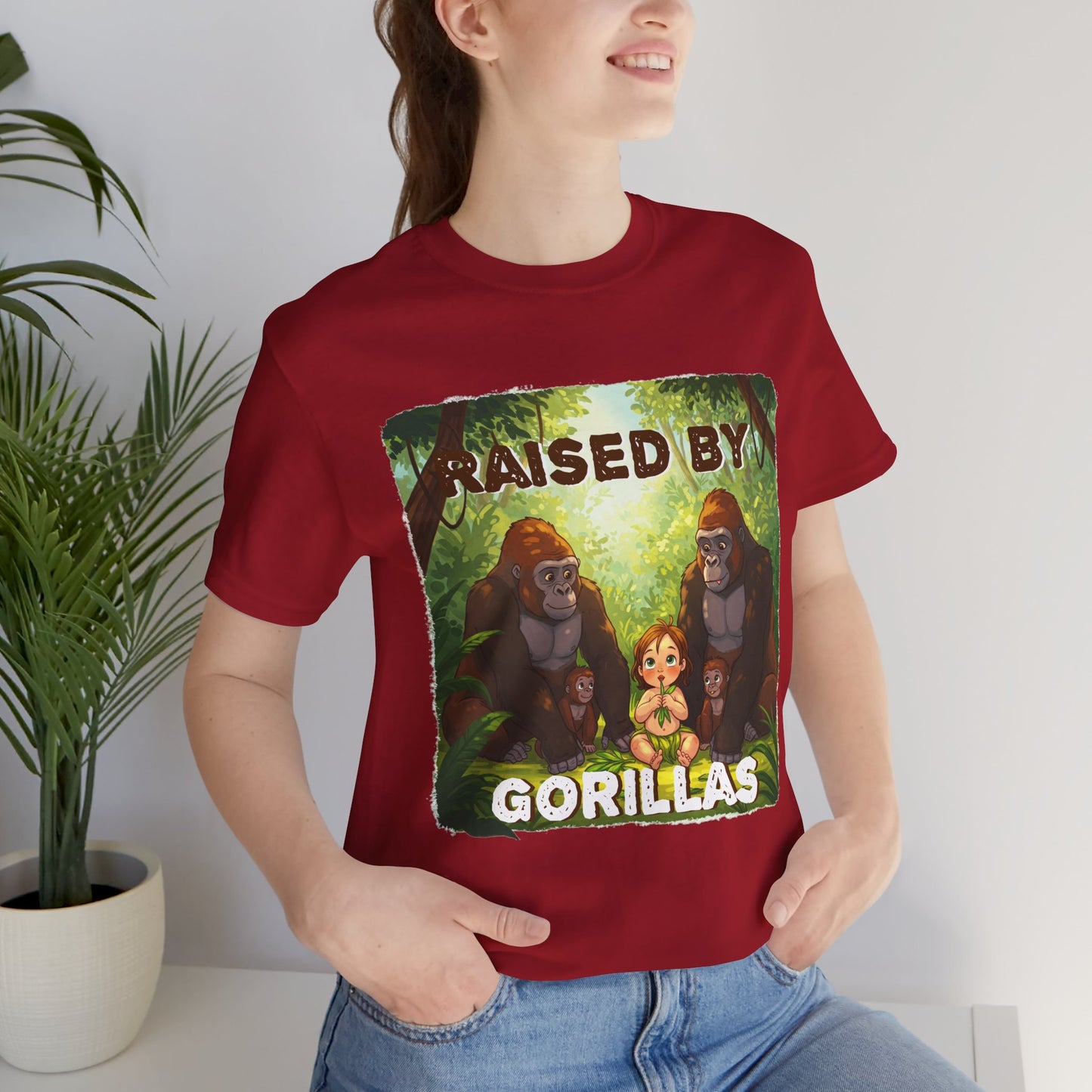 Funny Gorilla Graphic Tee - 'Raised by Gorillas' Unisex Jersey Shirt (Female character version) - Schmartypants