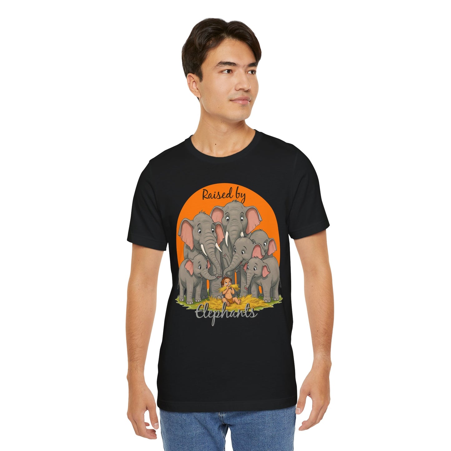 Elephant Lovers Tee - Funny 'Raised by Elephants' Unisex Jersey Short Sleeve Shirt - Wildlife and Nature Lovers Shirt (Male Character Version) - Schmartypants