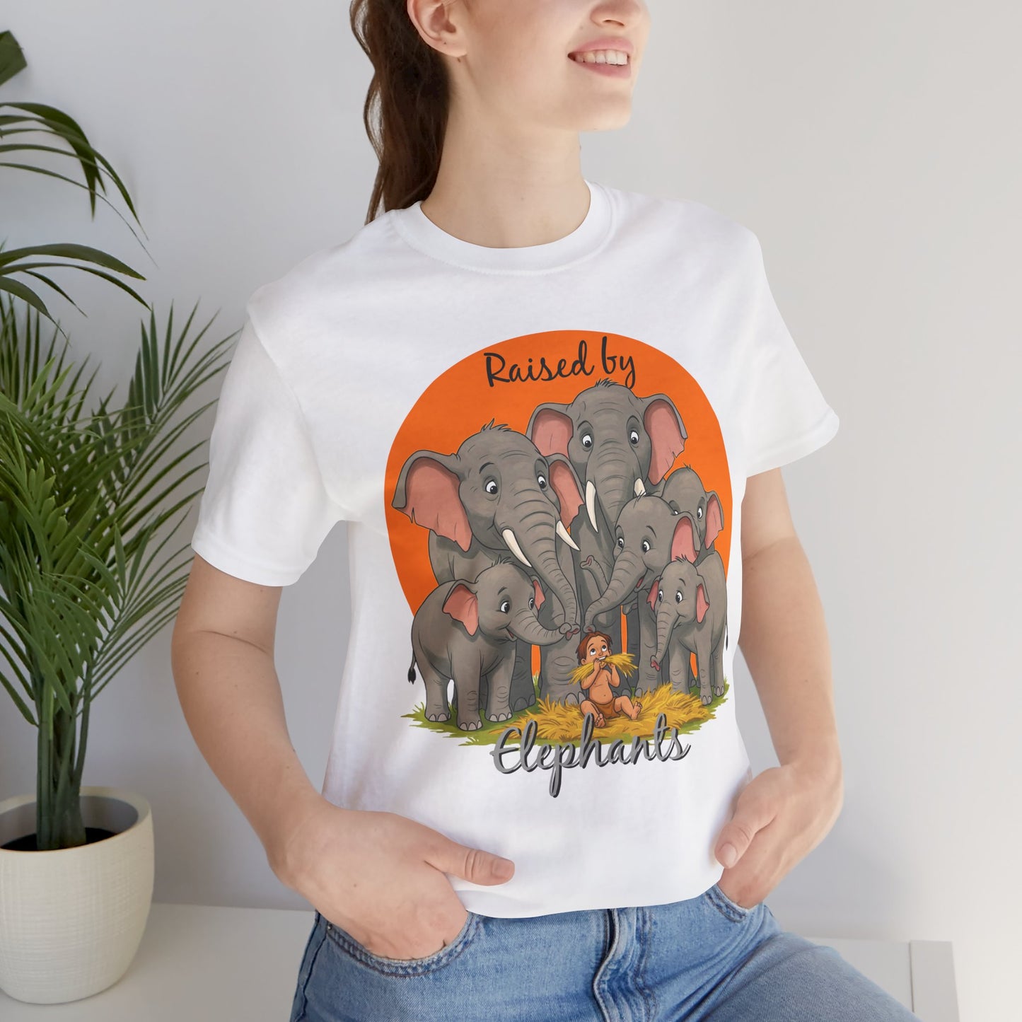Elephant Lovers Tee - Funny 'Raised by Elephants' Unisex Jersey Short Sleeve Shirt - Wildlife and Nature Lovers Shirt (Male Character Version) - Schmartypants