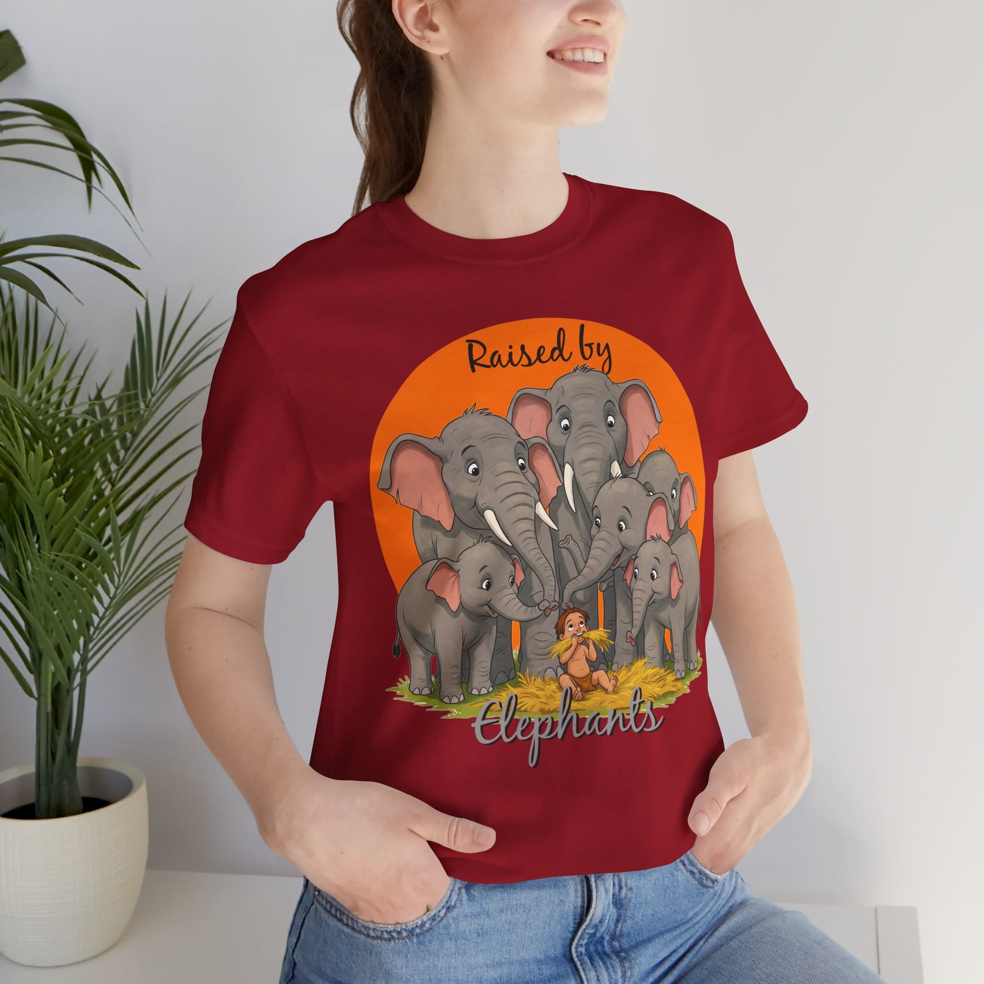 Elephant Lovers Tee - Funny 'Raised by Elephants' Unisex Jersey Short Sleeve Shirt - Wildlife and Nature Lovers Shirt (Male Character Version) - Schmartypants