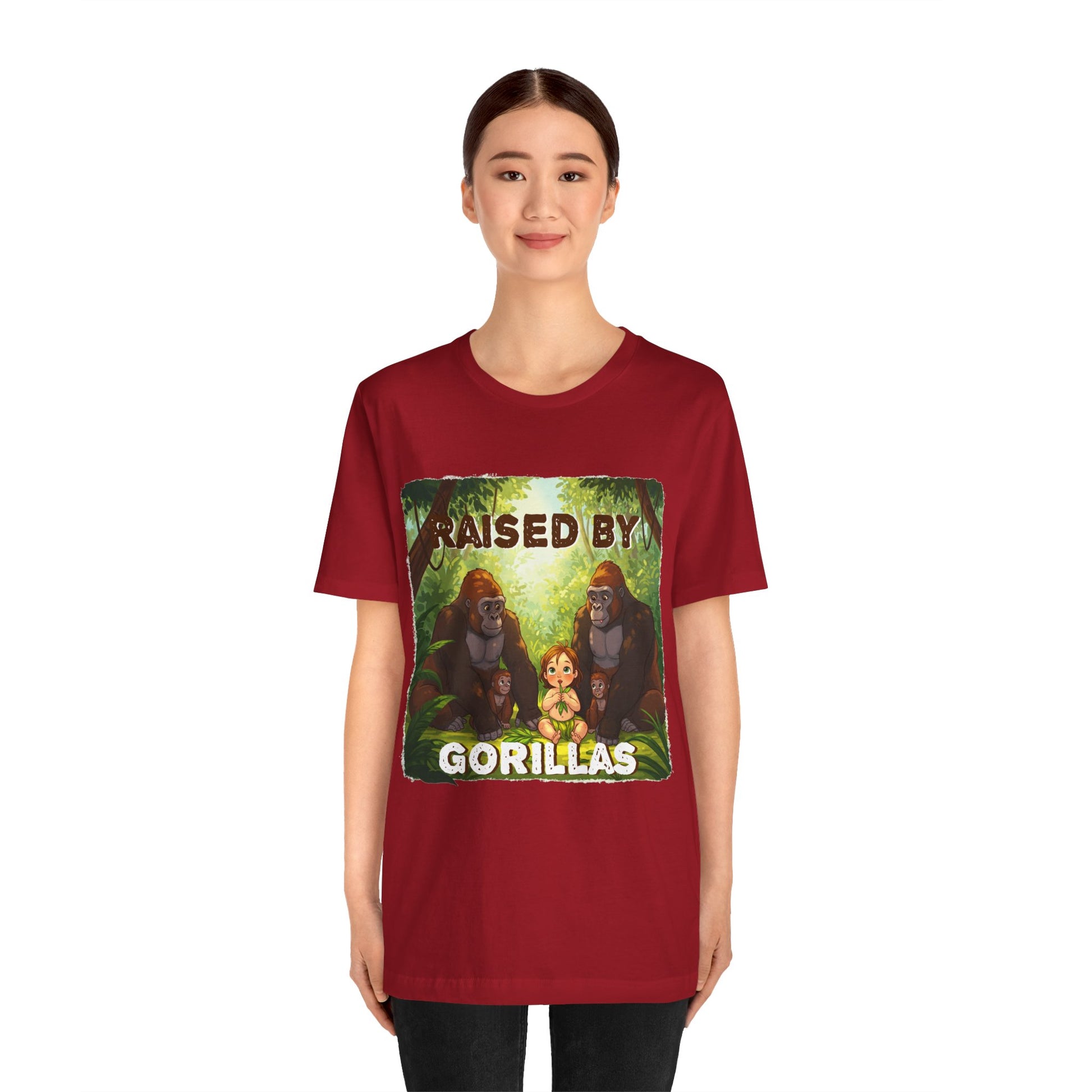Funny Gorilla Graphic Tee - 'Raised by Gorillas' Unisex Jersey Shirt (Female character version) - Schmartypants