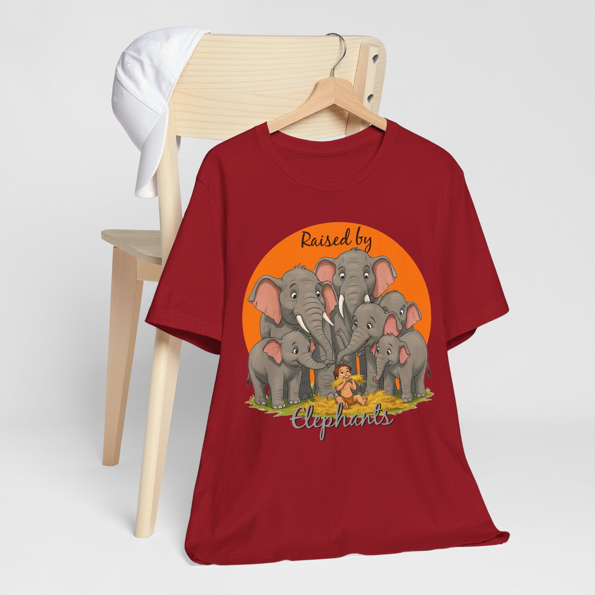 Elephant Lovers Tee - Funny 'Raised by Elephants' Unisex Jersey Short Sleeve Shirt - Wildlife and Nature Lovers Shirt (Male Character Version) - Schmartypants