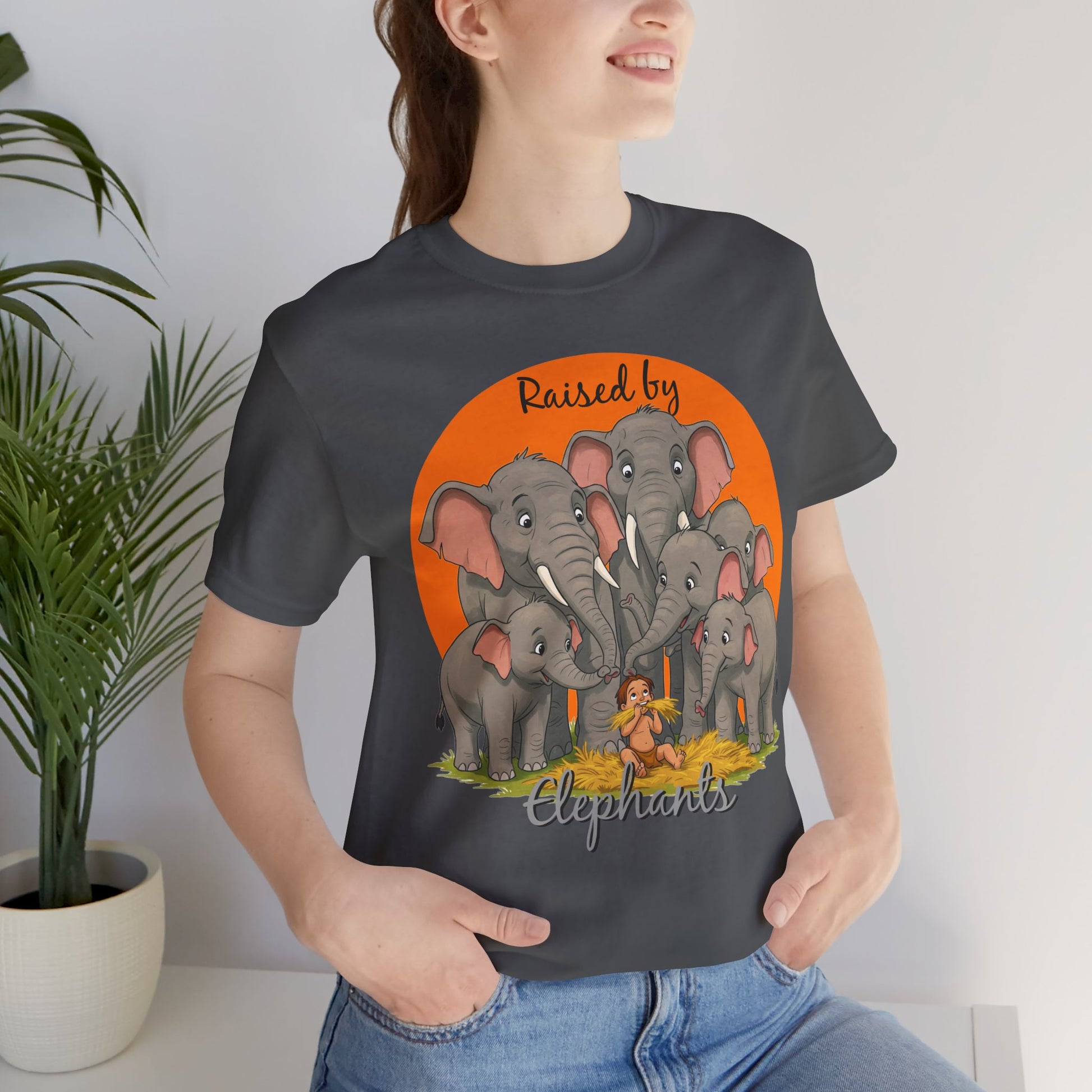Elephant Lovers Tee - Funny 'Raised by Elephants' Unisex Jersey Short Sleeve Shirt - Wildlife and Nature Lovers Shirt (Male Character Version) - Schmartypants