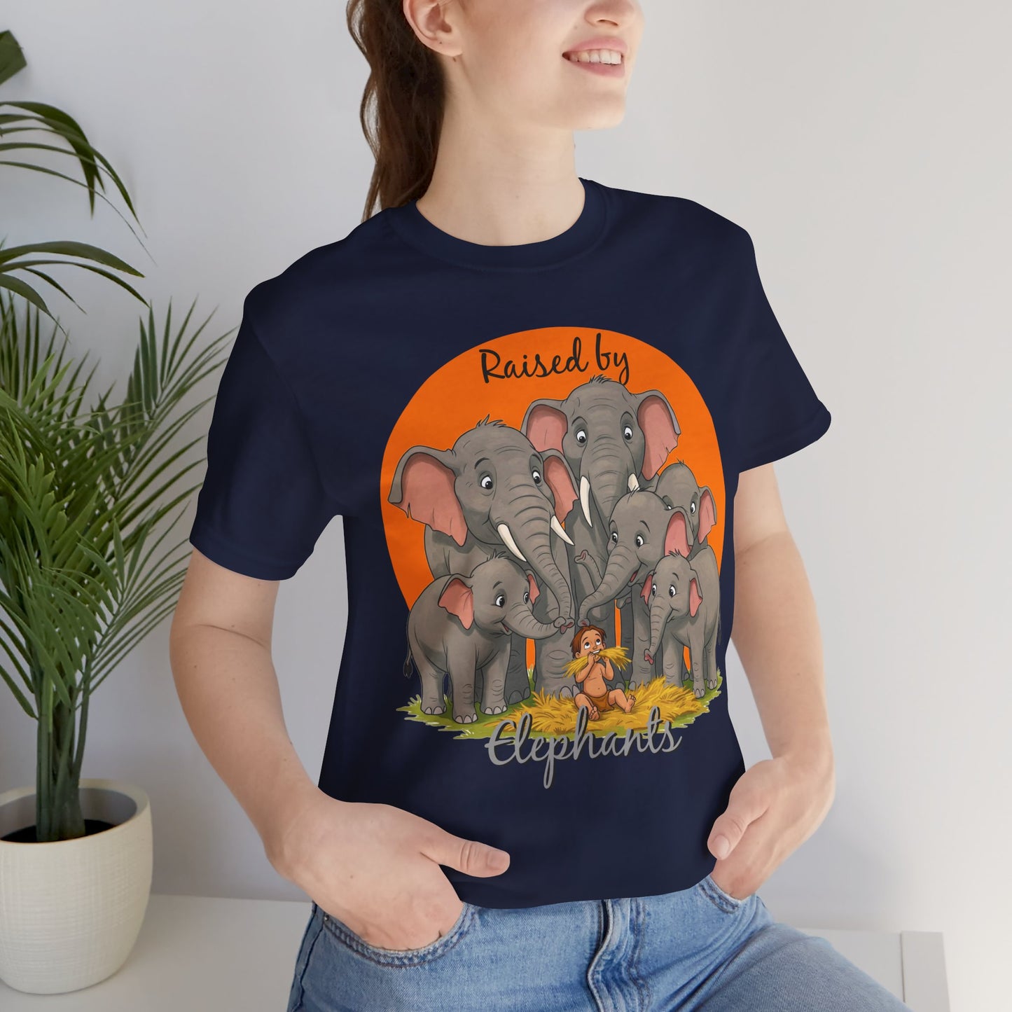 Elephant Lovers Tee - Funny 'Raised by Elephants' Unisex Jersey Short Sleeve Shirt - Wildlife and Nature Lovers Shirt (Male Character Version) - Schmartypants